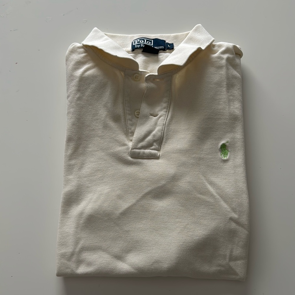 Polo by Ralph Lauren. Short sleeve collared 2 buttons. Color- ecrue. Size-large